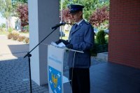 asp. szt. Szymon Jeleń - lektor, stoi przy mównicy